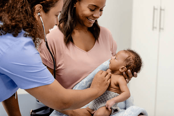 Doctor consulting with a mother and child